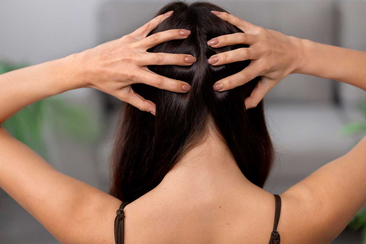 woman-doing-herself-scalp-massage