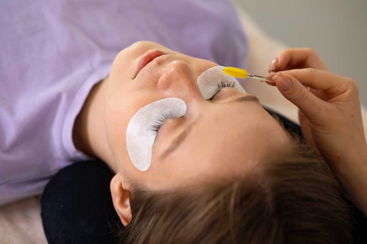 woman-wearing-eye-patches-high-angle